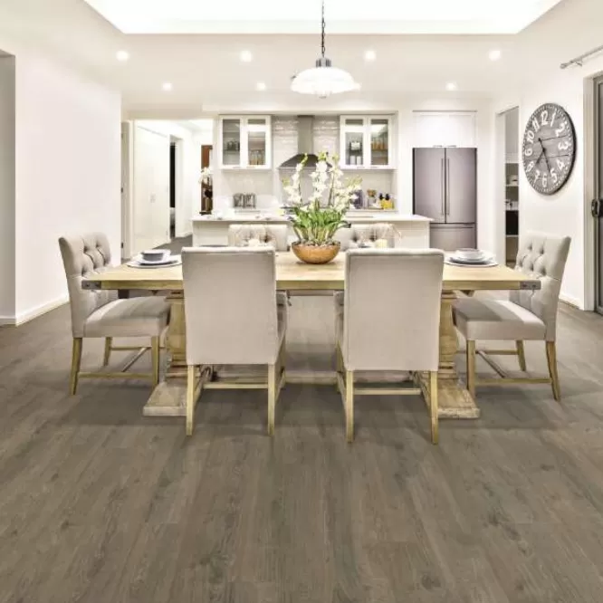 Installed view of Chesapeake All American Gunbarrel Oak laminate flooring